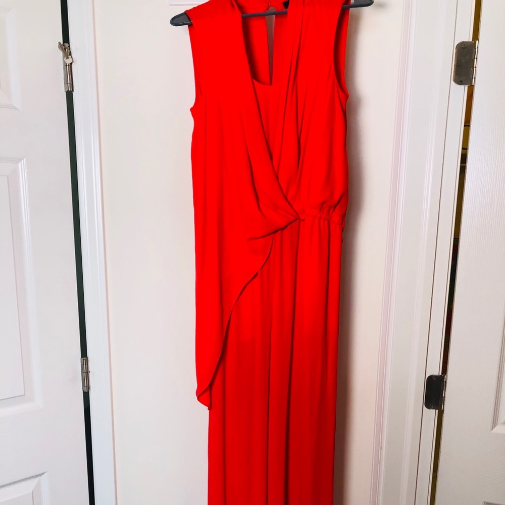BCBGMaxAzria Asymmetric shirt hem and jumpsuit.